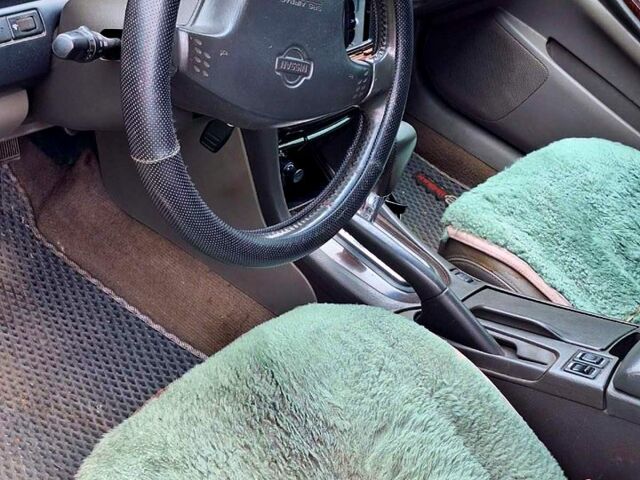 Синий Ниссан Максима, объемом двигателя 2 л и пробегом 280 тыс. км за 2100 $, фото 6 на Automoto.ua