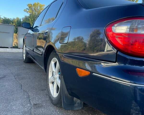 Синій Ніссан Максіма, об'ємом двигуна 2 л та пробігом 350 тис. км за 1500 $, фото 8 на Automoto.ua