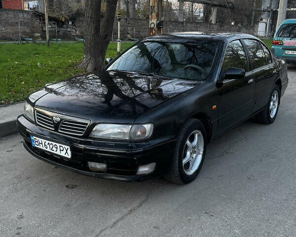 Зеленый Ниссан Максима, объемом двигателя 2 л и пробегом 225 тыс. км за 1950 $, фото 3 на Automoto.ua