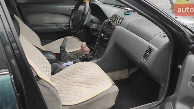 Зелений Ніссан Максіма, об'ємом двигуна 2 л та пробігом 450 тис. км за 2300 $, фото 3 на Automoto.ua