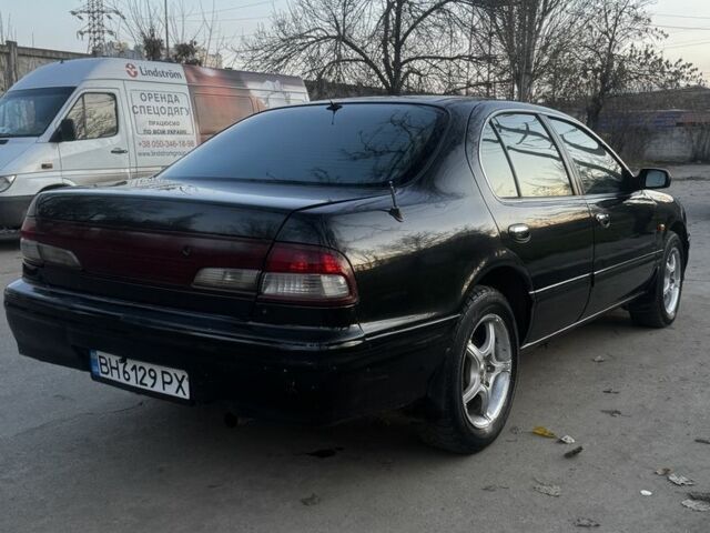 Зеленый Ниссан Максима, объемом двигателя 2 л и пробегом 224 тыс. км за 1950 $, фото 8 на Automoto.ua