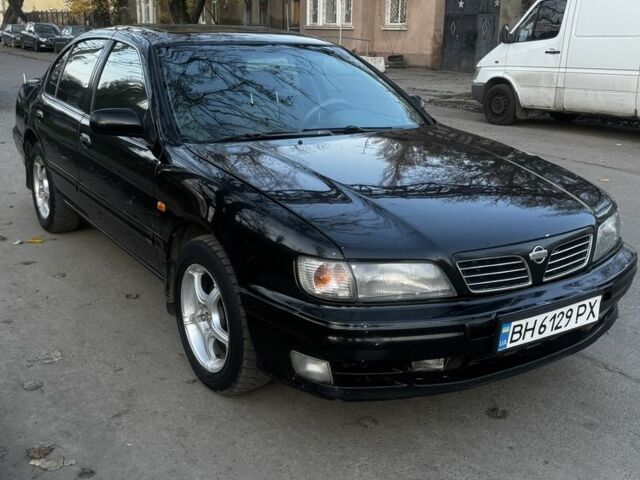 Зеленый Ниссан Максима, объемом двигателя 2 л и пробегом 224 тыс. км за 1950 $, фото 5 на Automoto.ua