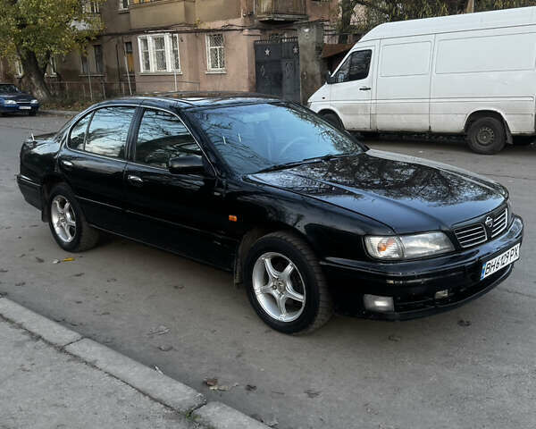 Зеленый Ниссан Максима, объемом двигателя 2 л и пробегом 225 тыс. км за 1950 $, фото 7 на Automoto.ua