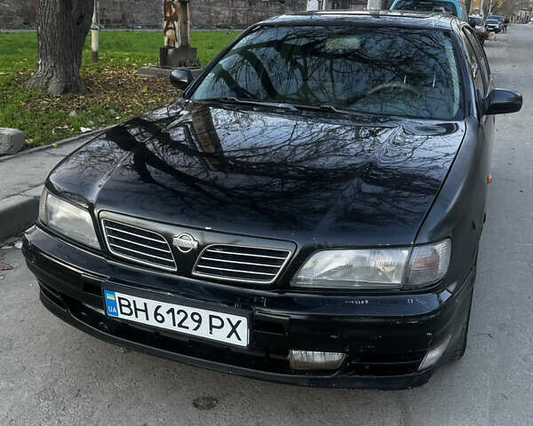 Зеленый Ниссан Максима, объемом двигателя 2 л и пробегом 225 тыс. км за 1950 $, фото 2 на Automoto.ua