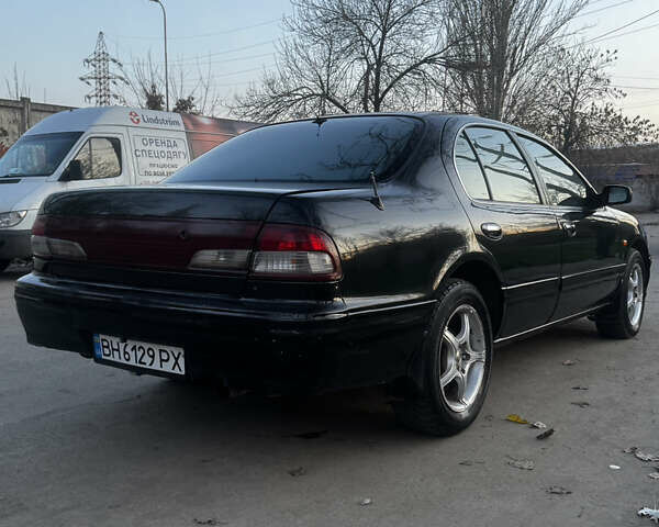 Зеленый Ниссан Максима, объемом двигателя 2 л и пробегом 225 тыс. км за 1950 $, фото 8 на Automoto.ua