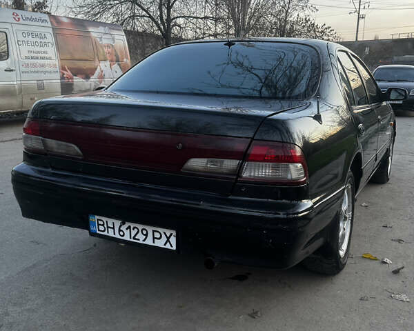 Зеленый Ниссан Максима, объемом двигателя 2 л и пробегом 225 тыс. км за 1950 $, фото 10 на Automoto.ua