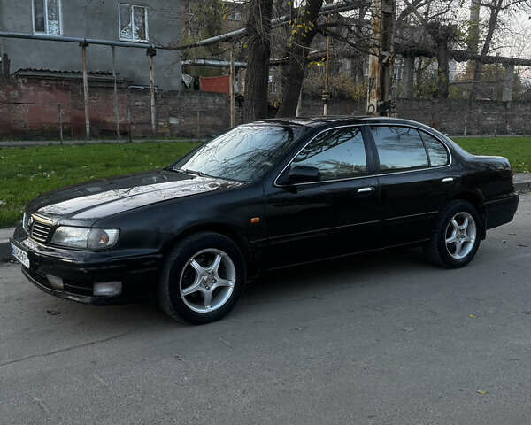 Зеленый Ниссан Максима, объемом двигателя 2 л и пробегом 225 тыс. км за 1950 $, фото 4 на Automoto.ua