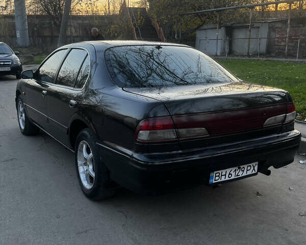 Зеленый Ниссан Максима, объемом двигателя 2 л и пробегом 225 тыс. км за 1950 $, фото 12 на Automoto.ua