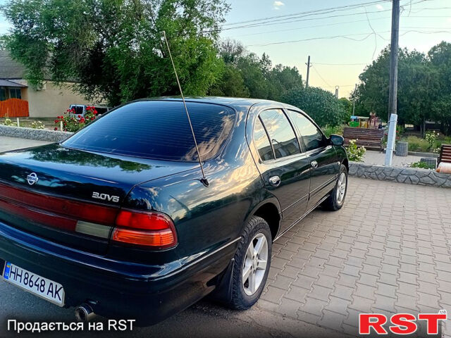 Зеленый Ниссан Максима, объемом двигателя 3 л и пробегом 395 тыс. км за 3800 $, фото 3 на Automoto.ua