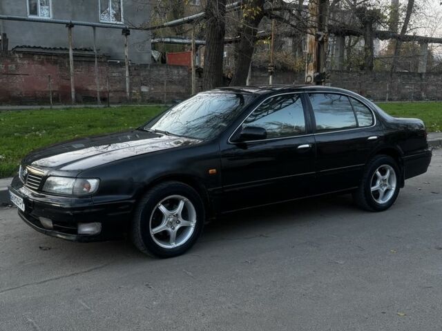 Зеленый Ниссан Максима, объемом двигателя 2 л и пробегом 224 тыс. км за 1950 $, фото 3 на Automoto.ua