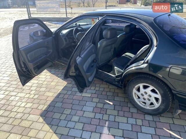 Зеленый Ниссан Максима, объемом двигателя 2 л и пробегом 300 тыс. км за 2700 $, фото 10 на Automoto.ua