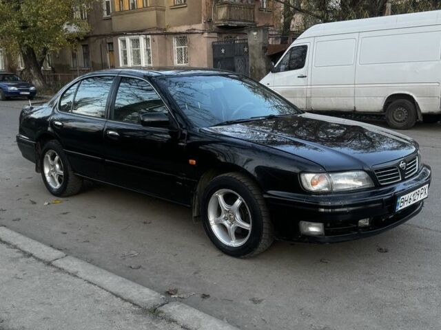 Зеленый Ниссан Максима, объемом двигателя 2 л и пробегом 224 тыс. км за 1950 $, фото 7 на Automoto.ua