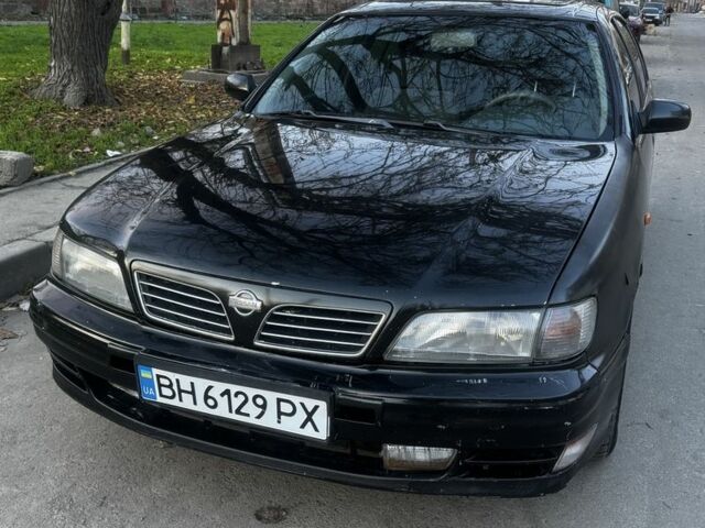 Зеленый Ниссан Максима, объемом двигателя 2 л и пробегом 224 тыс. км за 1950 $, фото 1 на Automoto.ua