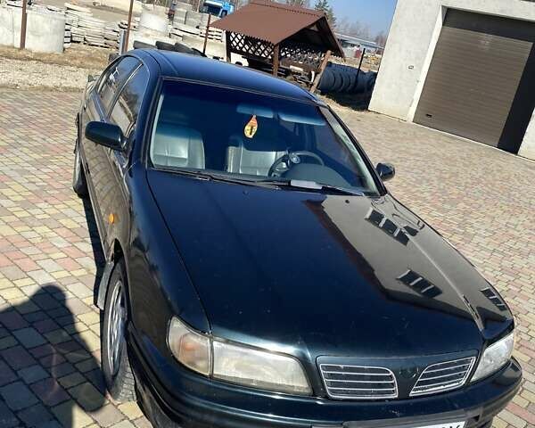 Зеленый Ниссан Максима, объемом двигателя 2 л и пробегом 300 тыс. км за 2700 $, фото 3 на Automoto.ua