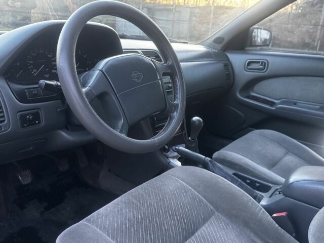 Зеленый Ниссан Максима, объемом двигателя 2 л и пробегом 224 тыс. км за 1950 $, фото 13 на Automoto.ua