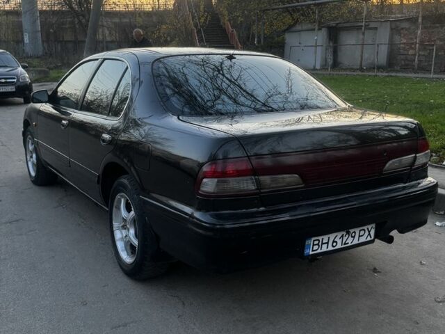 Зеленый Ниссан Максима, объемом двигателя 2 л и пробегом 224 тыс. км за 1950 $, фото 11 на Automoto.ua