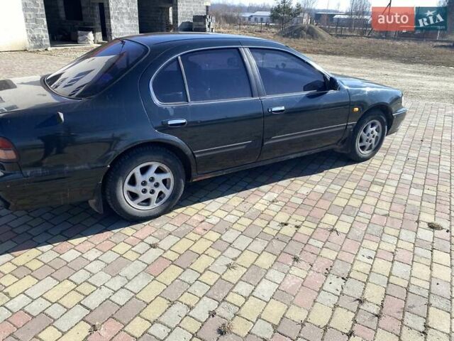 Зеленый Ниссан Максима, объемом двигателя 2 л и пробегом 300 тыс. км за 2700 $, фото 5 на Automoto.ua