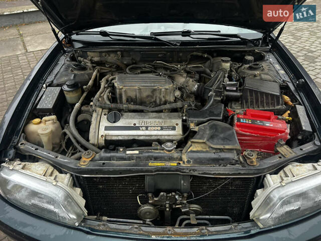 Зелений Ніссан Максіма, об'ємом двигуна 2 л та пробігом 200 тис. км за 1800 $, фото 11 на Automoto.ua