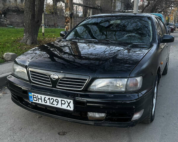 Зеленый Ниссан Максима, объемом двигателя 2 л и пробегом 225 тыс. км за 1950 $, фото 1 на Automoto.ua