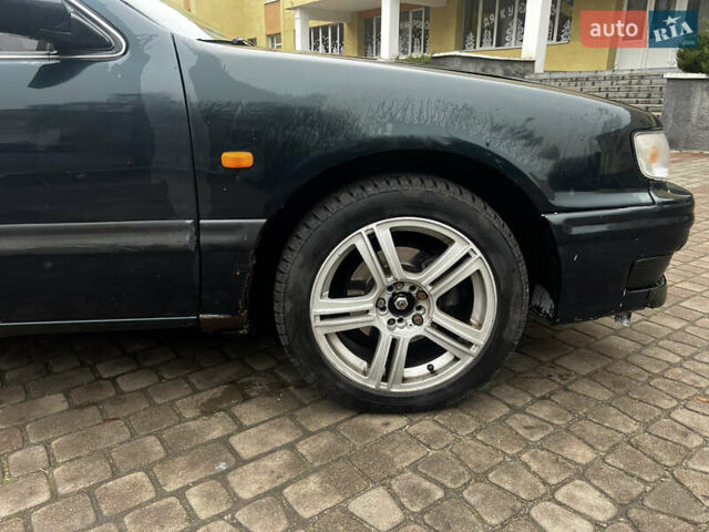 Зелений Ніссан Максіма, об'ємом двигуна 2 л та пробігом 200 тис. км за 1800 $, фото 5 на Automoto.ua