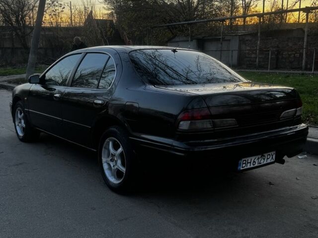 Зеленый Ниссан Максима, объемом двигателя 2 л и пробегом 224 тыс. км за 1950 $, фото 12 на Automoto.ua