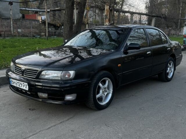 Зеленый Ниссан Максима, объемом двигателя 2 л и пробегом 224 тыс. км за 1950 $, фото 2 на Automoto.ua