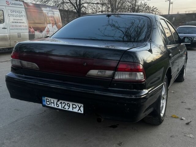 Зеленый Ниссан Максима, объемом двигателя 2 л и пробегом 224 тыс. км за 1950 $, фото 9 на Automoto.ua