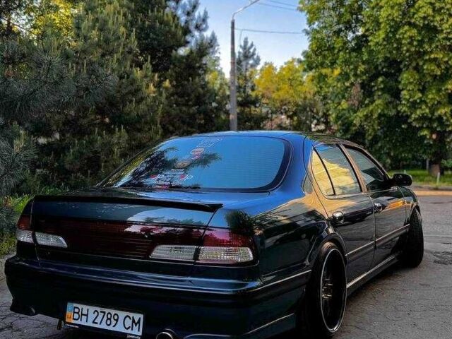 Зеленый Ниссан Максима, объемом двигателя 2 л и пробегом 277 тыс. км за 8300 $, фото 4 на Automoto.ua