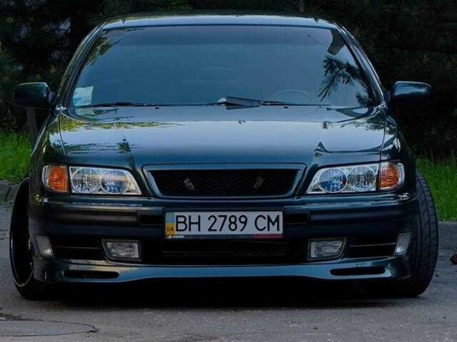 Зеленый Ниссан Максима, объемом двигателя 2 л и пробегом 277 тыс. км за 8300 $, фото 7 на Automoto.ua