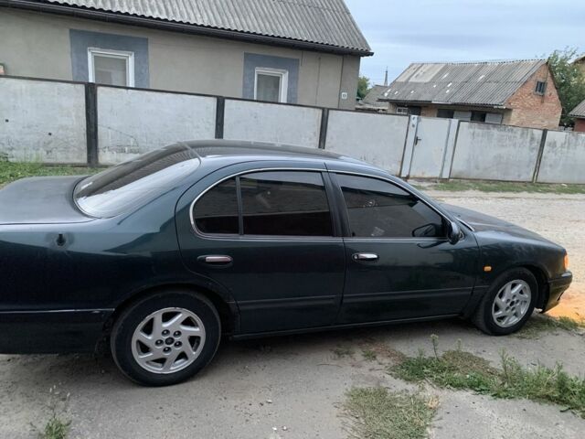 Зеленый Ниссан Максима, объемом двигателя 2 л и пробегом 444 тыс. км за 1500 $, фото 3 на Automoto.ua