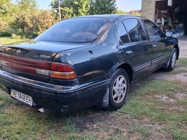 Зелений Ніссан Максіма, об'ємом двигуна 2 л та пробігом 290 тис. км за 1024 $, фото 3 на Automoto.ua