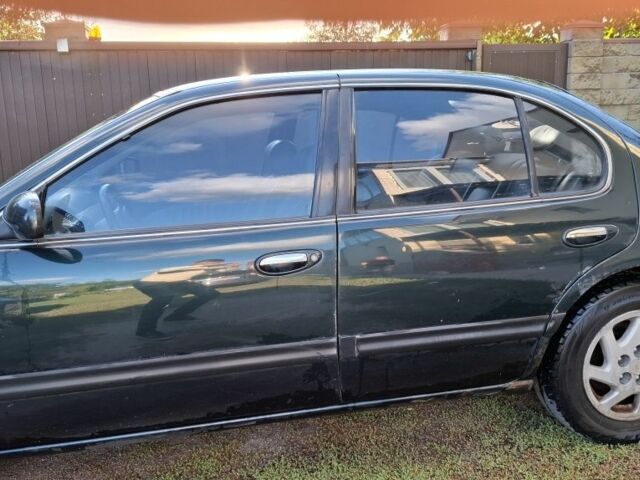 Зелений Ніссан Максіма, об'ємом двигуна 2 л та пробігом 290 тис. км за 1024 $, фото 9 на Automoto.ua