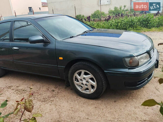 Зелений Ніссан Максіма, об'ємом двигуна 3 л та пробігом 350 тис. км за 3200 $, фото 3 на Automoto.ua