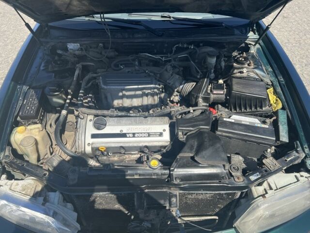 Зелений Ніссан Максіма, об'ємом двигуна 2 л та пробігом 410 тис. км за 800 $, фото 7 на Automoto.ua