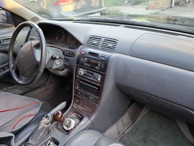 Зелений Ніссан Максіма, об'ємом двигуна 2 л та пробігом 290 тис. км за 1024 $, фото 21 на Automoto.ua