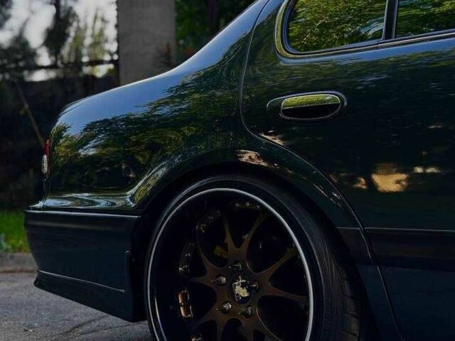 Зеленый Ниссан Максима, объемом двигателя 2 л и пробегом 277 тыс. км за 8300 $, фото 5 на Automoto.ua