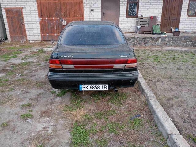 Зеленый Ниссан Максима, объемом двигателя 3 л и пробегом 250 тыс. км за 2000 $, фото 5 на Automoto.ua