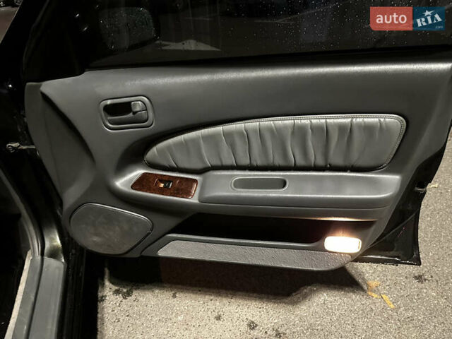 Зеленый Ниссан Максима, объемом двигателя 2 л и пробегом 280 тыс. км за 2400 $, фото 9 на Automoto.ua