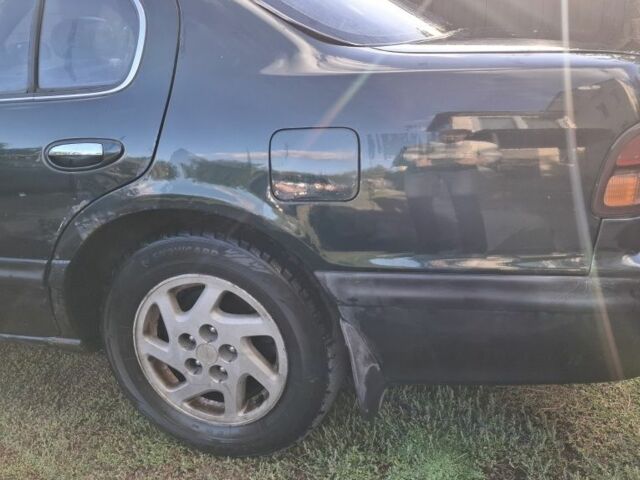 Зелений Ніссан Максіма, об'ємом двигуна 2 л та пробігом 290 тис. км за 1024 $, фото 4 на Automoto.ua