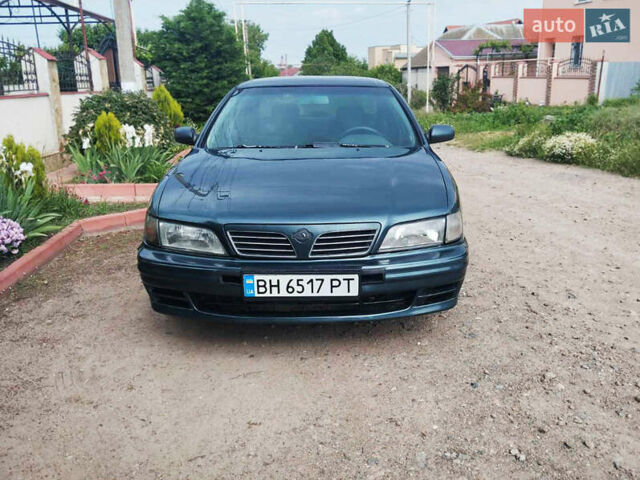 Зелений Ніссан Максіма, об'ємом двигуна 3 л та пробігом 350 тис. км за 3200 $, фото 2 на Automoto.ua