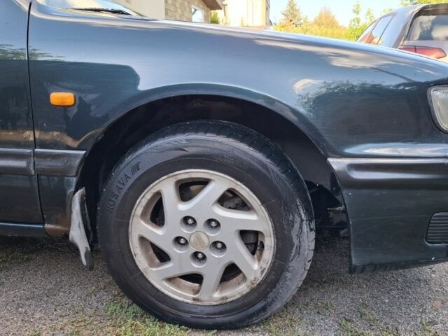 Зелений Ніссан Максіма, об'ємом двигуна 2 л та пробігом 290 тис. км за 1024 $, фото 15 на Automoto.ua