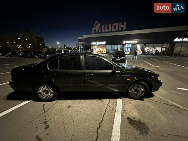 Зеленый Ниссан Максима, объемом двигателя 2 л и пробегом 280 тыс. км за 2400 $, фото 3 на Automoto.ua