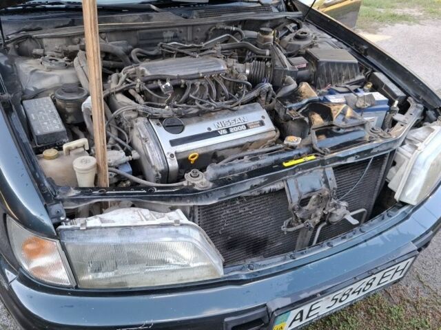 Зелений Ніссан Максіма, об'ємом двигуна 2 л та пробігом 290 тис. км за 1024 $, фото 13 на Automoto.ua