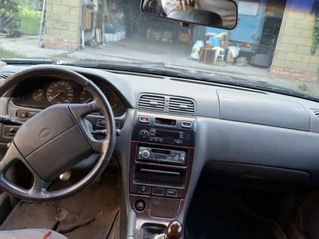 Зелений Ніссан Максіма, об'ємом двигуна 2 л та пробігом 290 тис. км за 1024 $, фото 12 на Automoto.ua