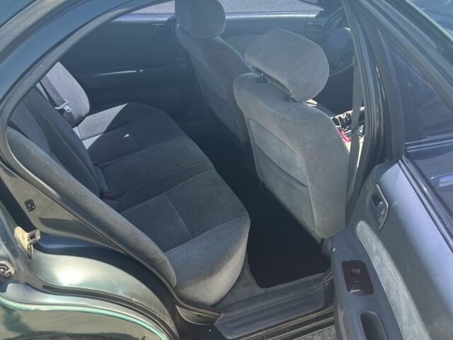 Зелений Ніссан Максіма, об'ємом двигуна 2 л та пробігом 410 тис. км за 800 $, фото 6 на Automoto.ua