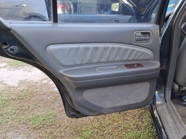 Зелений Ніссан Максіма, об'ємом двигуна 2 л та пробігом 290 тис. км за 1024 $, фото 17 на Automoto.ua