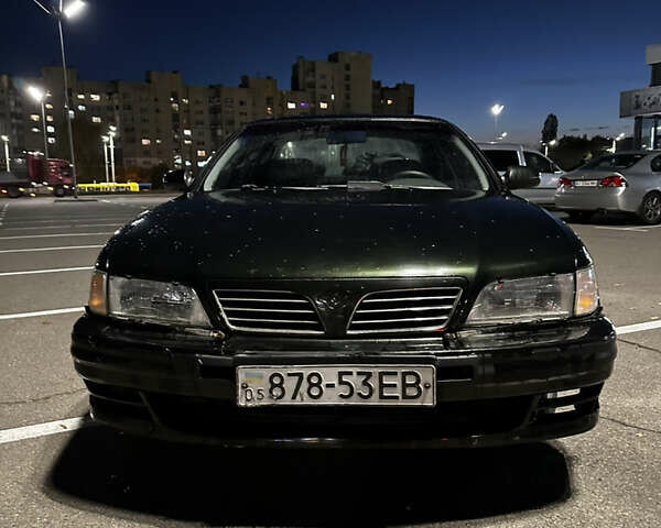 Зеленый Ниссан Максима, объемом двигателя 2 л и пробегом 280 тыс. км за 2400 $, фото 1 на Automoto.ua