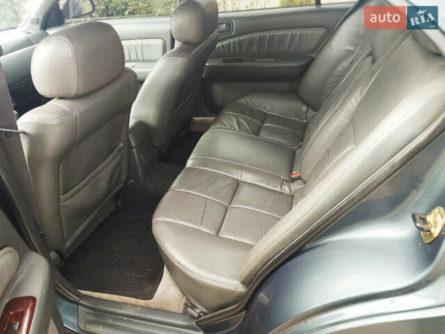 Зелений Ніссан Максіма, об'ємом двигуна 3 л та пробігом 350 тис. км за 3200 $, фото 7 на Automoto.ua