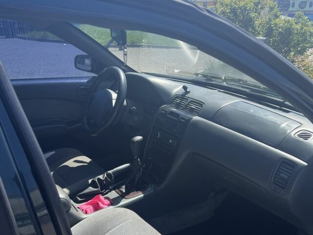 Зелений Ніссан Максіма, об'ємом двигуна 2 л та пробігом 410 тис. км за 800 $, фото 5 на Automoto.ua