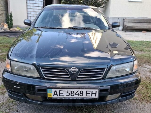 Зелений Ніссан Максіма, об'ємом двигуна 2 л та пробігом 290 тис. км за 1024 $, фото 7 на Automoto.ua